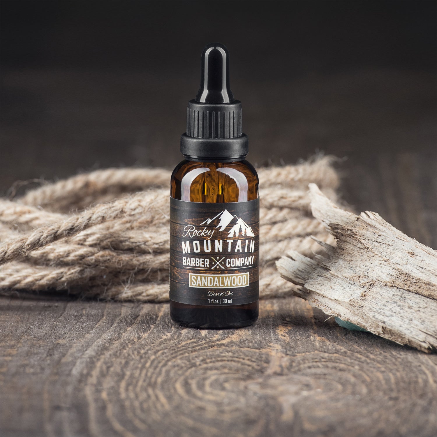 Rocky Mountain Barber Company Sandalwood Beard Oil on Wooden Table